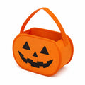 Süßigkeitentasche 25 x 12 x 20 cm aus Polyester orange mit Kürbisgesicht und Tragegriff
